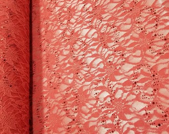 Coral Corded Lace Fabric With Black Bling All Over sold by the yard