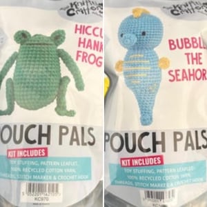 May include: Two Pouch Pals craft kits. One kit features a green crocheted frog named Hiccu Hana Frog. The other kit features a blue crocheted seahorse named Bubbl the Seahorse. Each kit includes toy stuffing, pattern leaflet, recycled cotton yarn, threads, stitch marker, and crochet hook.