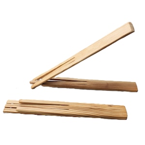 May include: Three wooden picture frame hangers. Two are connected, forming an angled support, and one is flat. The wood has a light, natural color with visible grain. The design is simple and functional.