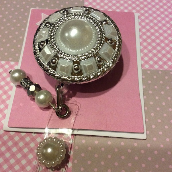 Faux pearl silver tone round retractable badge holder