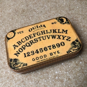 Tabla Ouija en lata modificada
