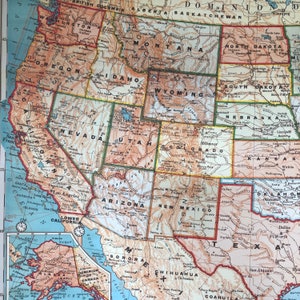 May include: A vintage map of the United States, showing state borders and major cities. The map is in shades of brown, green, and yellow, with a blue border around the country. The map includes the states of Washington, Oregon, California, Nevada, Utah, Arizona, New Mexico, Colorado, Wyoming, Montana, Idaho, North Dakota, South Dakota, Nebraska, Kansas, Oklahoma, Texas, and more.