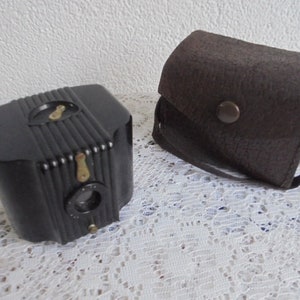 Thank you very much for your positive review.baby brownie kodak camera with original leather bag/kodak camera/bakelite camera