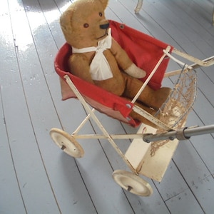 midcentury poppenwagen/wandel wagen uit de 60s/opvouwbare wagen/torck poppenwagen 60s