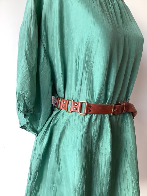 Narrow leather belt with brass belt buckle thin le