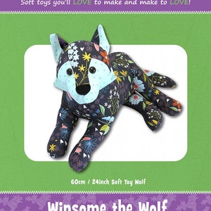 May include: A soft toy wolf, 24 inches long, with a floral pattern on a dark background. The wolf has a light blue face and ears. The image includes the text "funky friends factory" and "Winsome the Wolf."