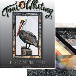 May include: A quilting kit featuring a brown pelican with the text "Brown Pelican" and "16 1/4 x 25 1/2". The kit includes fabric and a pattern.