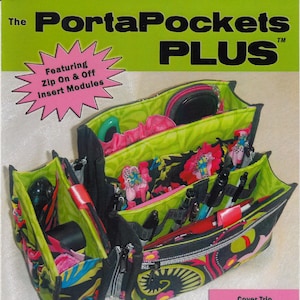 May include: The PortaPockets PLUS organizer bag, with zip-on and off insert modules. The bag has a black, green, and floral design. Cover Trio dimensions are 28cm L x 14cm W x 18cm H. The Basic Insert is 20cm L x 6cm W x 14cm H.