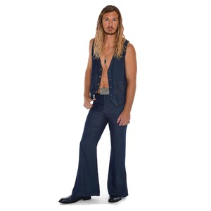 May include: A denim vest and flared jeans outfit. The vest is buttoned and the jeans have a wide bell-bottom style. The outfit is a dark blue color. The person is wearing a belt with a silver buckle and a necklace.