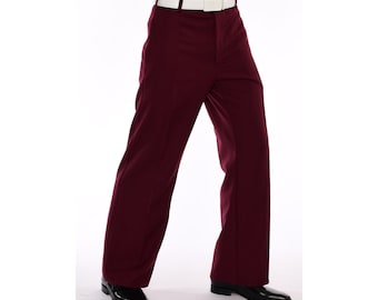 May include: A pair of wide-legged pants in a deep burgundy color. The pants have a straight leg and a slightly flared hem. They are made of a smooth, wrinkle-resistant fabric.