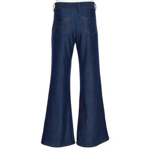 May include: Dark blue denim bell-bottom pants. The pants have a high waist and feature two back pockets with decorative stitching. The flared legs create a retro silhouette. The pants are made of a sturdy denim material.