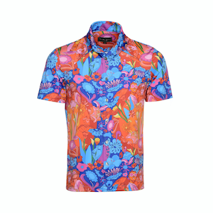 May include: A short-sleeved button-down shirt with a colorful floral print. The shirt features a variety of flowers, leaves, and abstract shapes in shades of red, orange, blue, and pink.