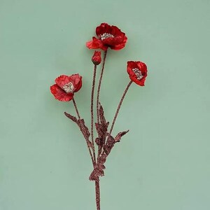 Puede incluir: Un ramo de tres flores de amapola rojas con detalles de purpurina. Los tallos son marrones y tienen peque&ntilde;as hojas verdes.
