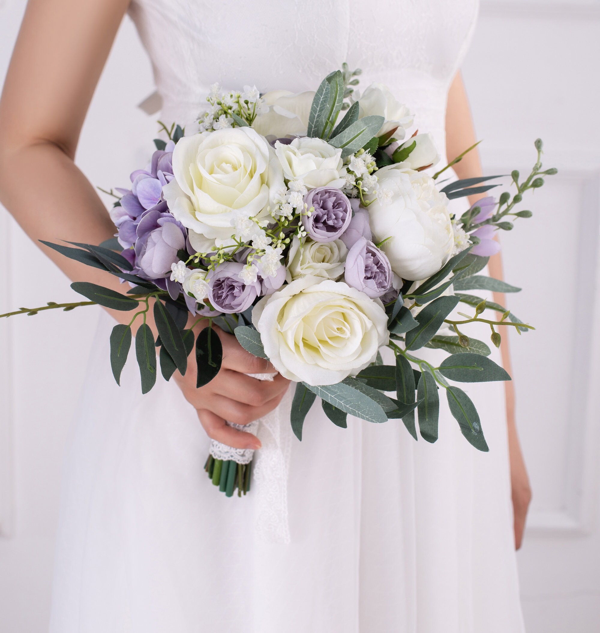 Purple and white bridesmaid bouquets 2025