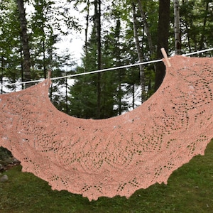Hand spun, hand knit lace shawl -- alpaca, mohair, and Red Eri Silk blended, spun and knit to make a lightweight shawl.