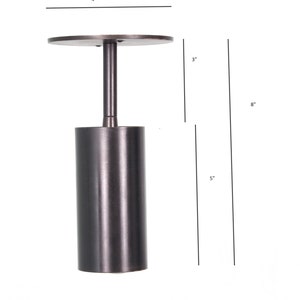 May include: A black metal ceiling light fixture with a cylindrical shade and a round canopy. The fixture is 8 inches tall, 4 inches wide, and 3 inches deep.