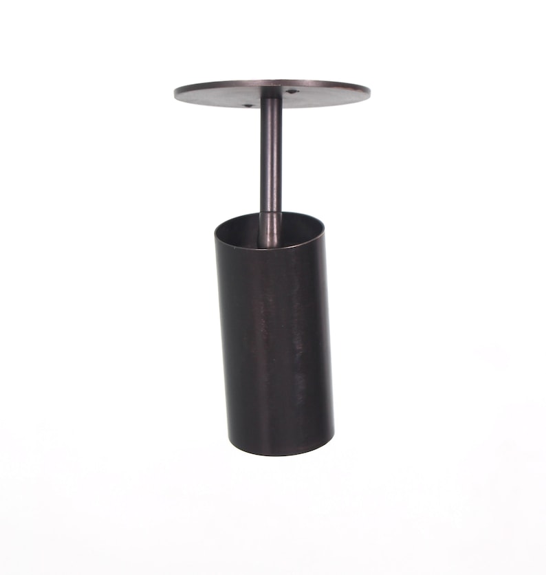 May include: A black metal ceiling light fixture with a cylindrical shade and a round canopy.