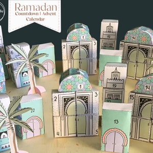 Può includere: Un calendario dell'Avvento stampabile per il Ramadan, con una città di carta colorata che include moschee, palme e numeri da 1 a 22. Il calendario è progettato per essere ritagliato e assemblato.