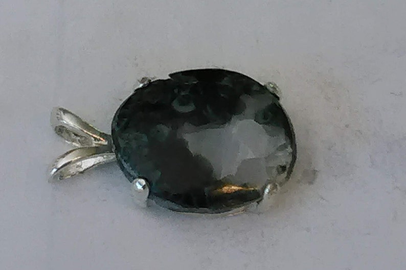 Hand crafted Michigan cabochon Green Stone in a sterling silver pendant setting