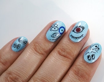 Calcomanías de uñas con efecto tobogán de agua: ojos, pestañas y ojos saltones