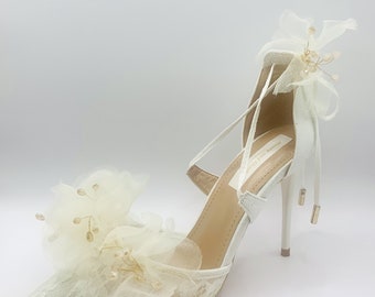 Superbes chaussures de mariée romantiques en dentelle