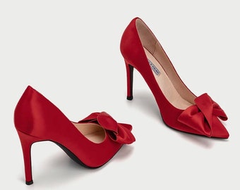 red satin pumps