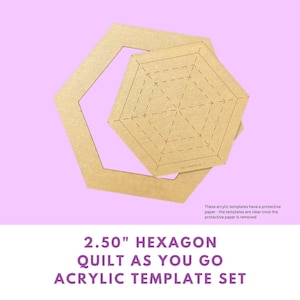 May include: A set of two acrylic quilting templates in the shape of a hexagon. The larger template is 2.50 inches across and has a grid pattern. The smaller template is a simple hexagon shape. The templates are on a light purple background.