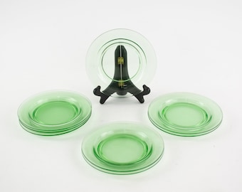 Set of Eight Uranium Glass Saucer Plates