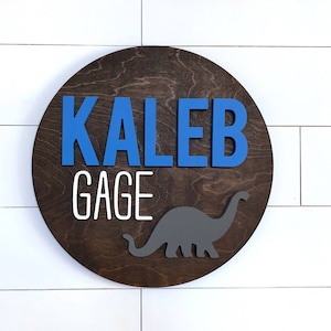 Custom Name Sign |  Round Sign | Baby Name Sign | Nursery Room Decor | Wood Sign | Nursery Wall Art | Baby Shower Gift | Dinosaur Nursery