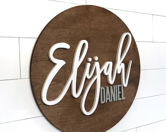 Round wooden name sign — retailer product photograph