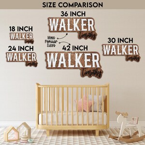 May include: A size comparison chart for custom wooden name signs featuring the name Walker Timothy in various widths including 18, 24, 30, 36, and 42 inches. The signs have white block lettering on a brown wood background with black script text.