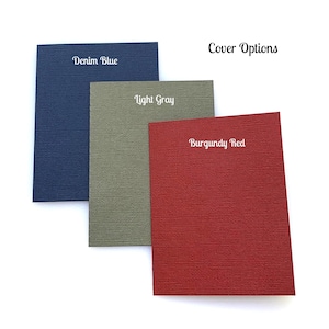 May include: Three sample notebook covers in denim blue, light gray, and burgundy red. The text "Cover Options" is at the top of the image.