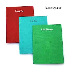 May include: Three cardstock samples in different colors: rouge red, teal blue, and emerald green. The cardstock has a textured surface. "Cover Options" is written at the top of the image.