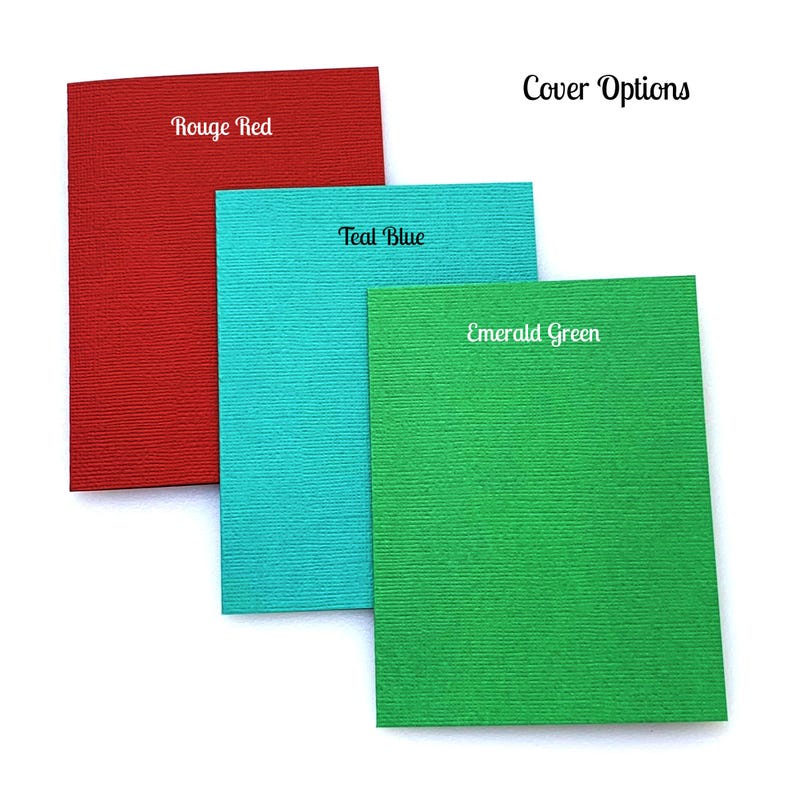 May include: Three cardstock samples in different colors: rouge red, teal blue, and emerald green. The cardstock has a textured surface. "Cover Options" is written at the top of the image.