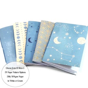 May include: Five small blue notebooks with different celestial patterns, including moons, stars, and constellations. The notebooks are made with 28lb/104gsm paper in white or cream and are available in 12 sizes and 24 paper pattern options.