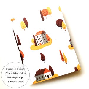 May include: White paper with a repeating pattern of houses and trees in autumn colors. The image includes text that reads "Choose from 12 Sizes & 24 Paper Pattern Options 28lb/104gsm Paper in White or Cream."