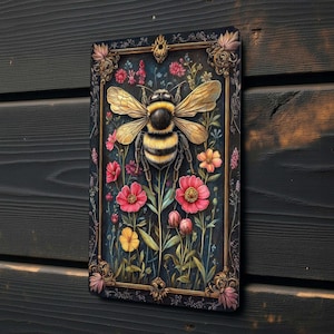 The sign includes two pre-drilled holes for easy hanging and works well as garden decor, bee themed wall decor, floral wall art, cottage style decor, or indoor and outdoor accent decor.