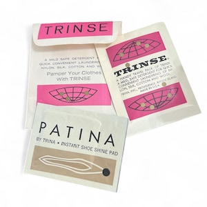 May include: Several vintage paper packets with the brand name "TRINSE" in pink and white. One packet reads "PATINA BY TRINA INSTANT SHOE SHINE PAD". The packets are for laundry detergent and shoe shine.