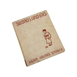 May include: A hardcover book titled Swords and Iris by Lilian Holmes Strack. The cover is a light beige fabric with dark red text and a simple line drawing of a person standing and looking down at a small turtle on the ground.