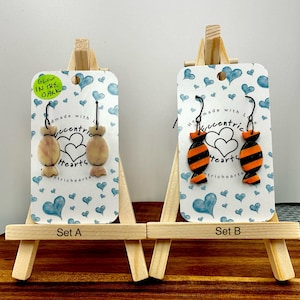 Halloween candy treats dangle earrings, surgical stainless steel ear wire, handmade, glow in dark, orange and black stripes