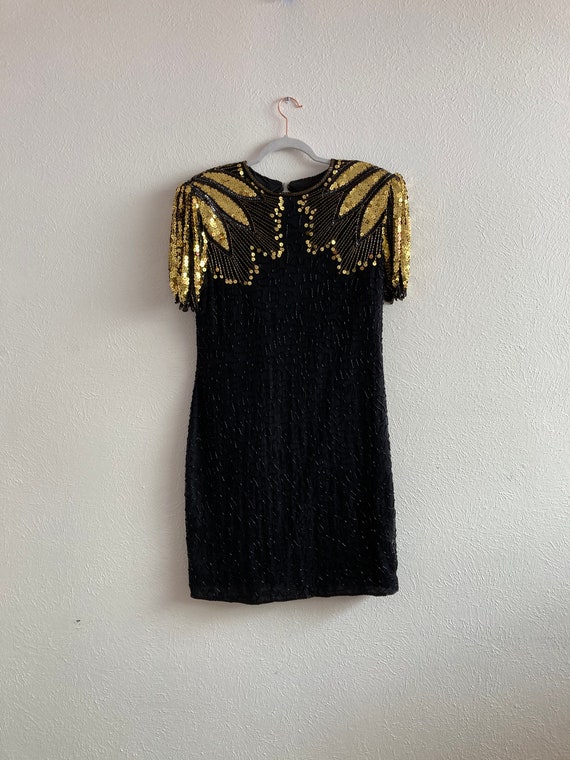 Scala black dress with gold sequin shoulders