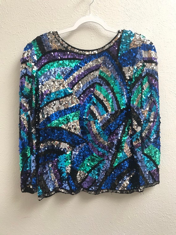 Medium Blue teal and silver sequin top with low ba
