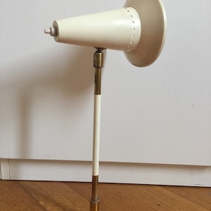 Mid century. Wall lamp by Stilnovo.
