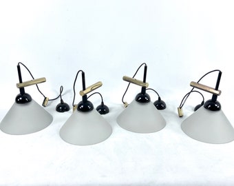 Rare Set of four Italian Modern brass and Murano glass wall lamps by Quattrifolio. 1970s