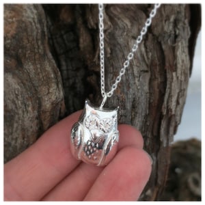 Sterling silver owl pendant.