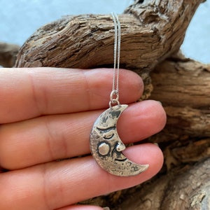 Celestial pendants. Crescent moon silver necklace necklace. Moon face.
