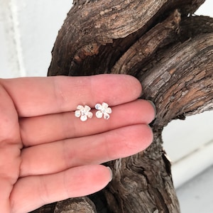 Tiny silver flower stud earrings, handmade from sterling silver, pierced earrings.