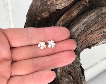 Tiny silver flower stud earrings, handmade from sterling silver, pierced earrings.