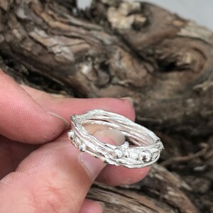 Zilveren nestring, dikke zilveren ring. Maat R.