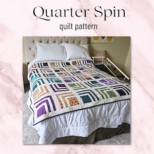 May include: A quilt pattern called "Quarter Spin" is shown on a bed with white sheets and a white headboard. The quilt is made with a variety of fabrics in shades of purple, green, orange, and white. The quilt is bordered with a dark purple fabric.